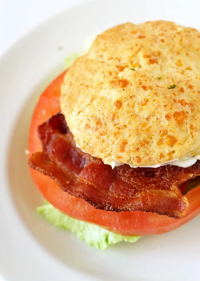 This cheddar chive biscuit BLT sandwich is going to be your new favorite lunch. #BetterBiscuits #ad | honeyandbirch.com