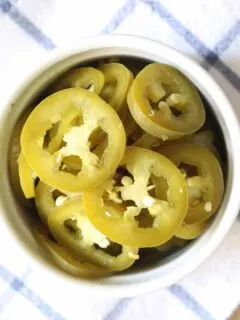 closeup photo of pickled jalapeños