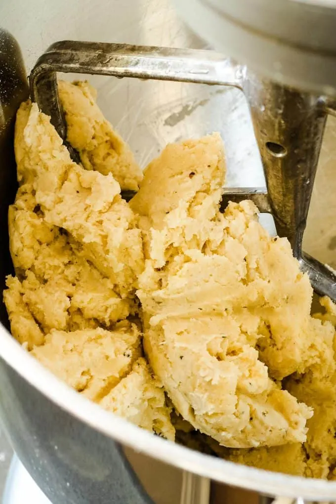 savory pie crust being made in a stand mixer