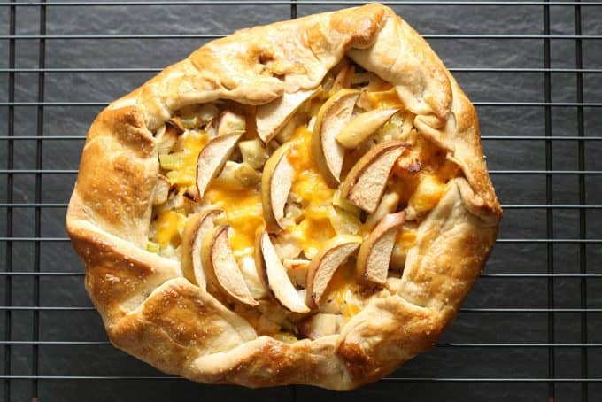 baked apple galette on a black wire rack