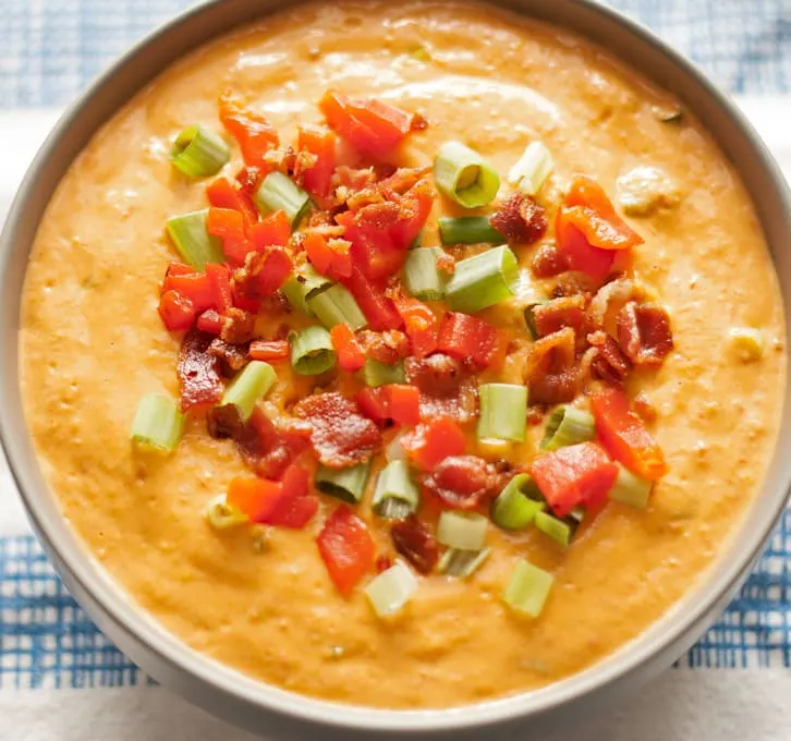 Make this hot pimento cheese dip the next time you are throwing a party or tailgating! It's the perfect fun appetizer! | honeyandbirch.com