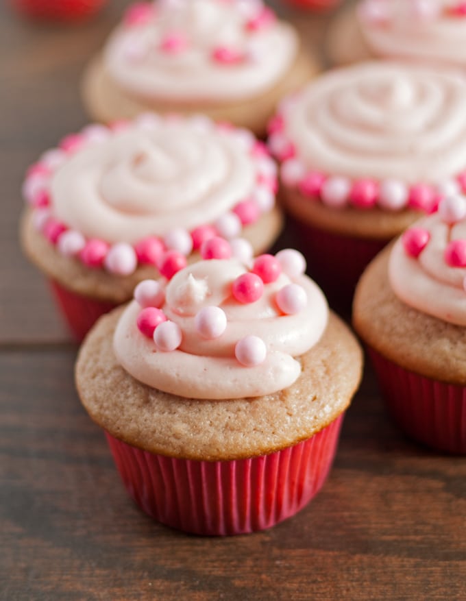 Double Berry Cupcakes - both the cupcakes and frosting are made with a mixture of raspberry and strawberry puree! | honeyandbirch.com