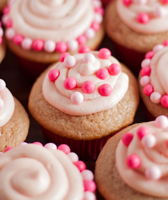 Double Berry Cupcakes - both the cupcakes and frosting are made with a mixture of raspberry and strawberry puree! | honeyandbirch.com