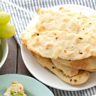 Try these homemade red pepper flatbread crackers with Laughing Cow cheese and some of these easy toppings to reinvent snacking! | honeyandbirch.com