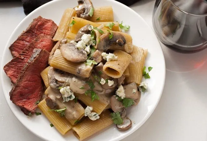 Mushroom Blue Cheese Rigatoni with a glass of red wine