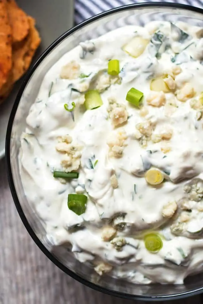 creamy blue cheese dip in a glass bowl