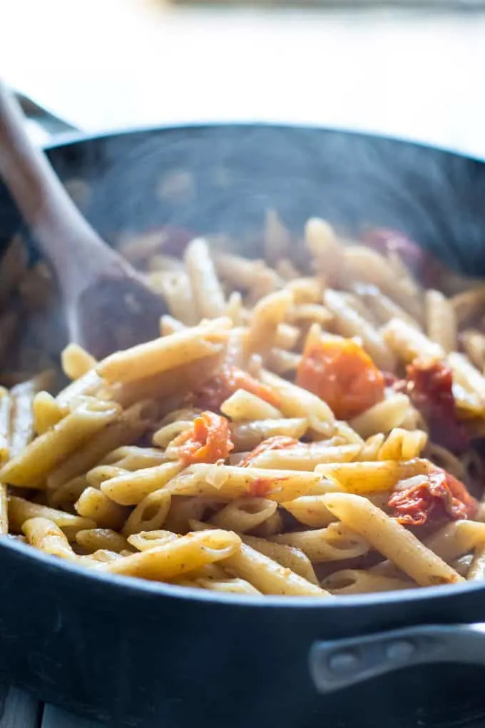 tomato pesto and pasta in a pan