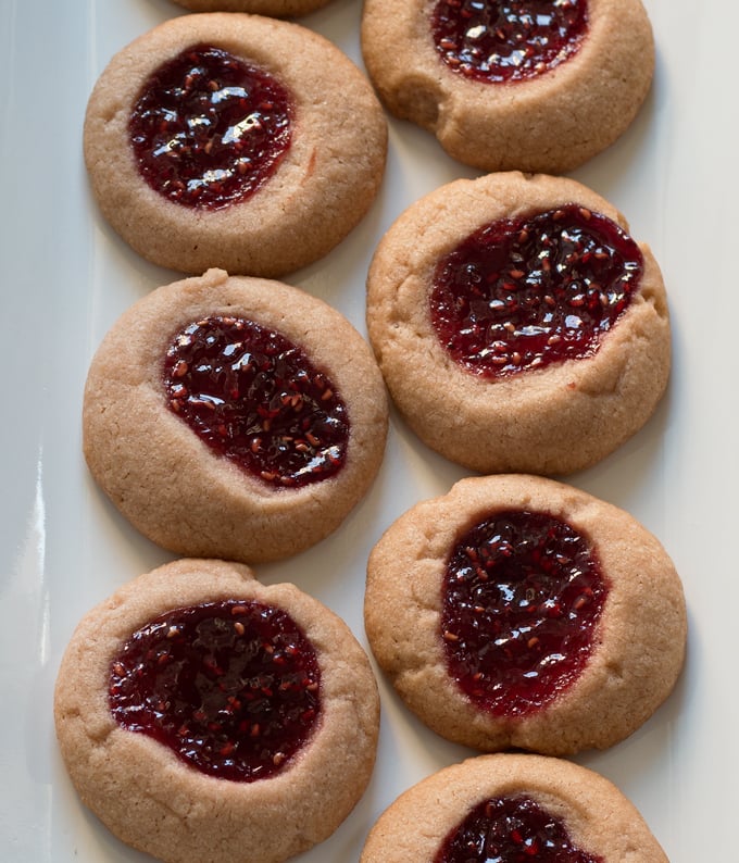 Raspberry chocolate shortbread thumbprint cookies - only 6 ingredients! These cookies are so easy to make and are my new Favorite! | honeyandbirch.com