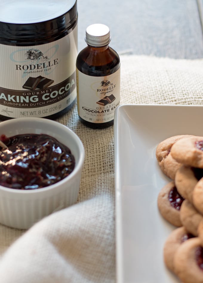 Raspberry chocolate shortbread thumbprint cookies - only 6 ingredients! These cookies are so easy to make and are my new Favorite! | honeyandbirch.com