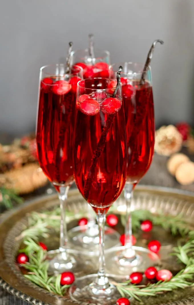 photo of vanilla cranberry mimosas garnished with vanilla beans