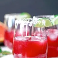 three grapefruit hibiscus margaritas