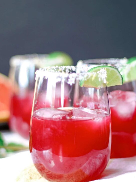 three grapefruit hibiscus margaritas