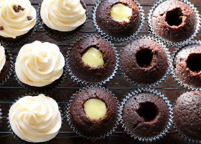 Grapefruit curd and grapefruit buttercream frosting are delicious when enjoyed with your favorite chocolate cupcake recipe. They are the perfect way to enjoy winter citrus! | honeyandbirch.com