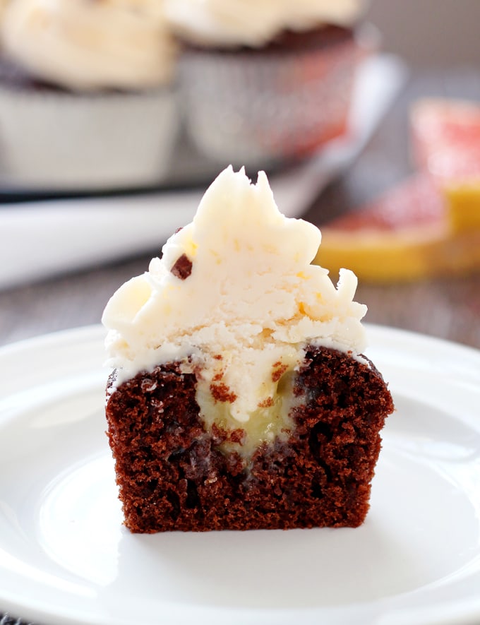 Grapefruit curd and grapefruit buttercream frosting are delicious when enjoyed with your favorite chocolate cupcake recipe. They are the perfect way to enjoy winter citrus! | honeyandbirch.com