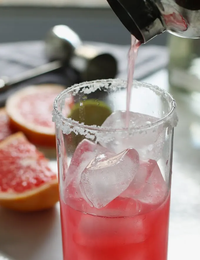 pouring a hibiscus paloma