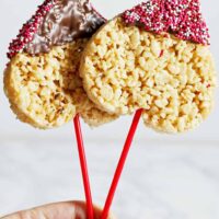 2 heart shaped Rice Krispie pops with sprinkles