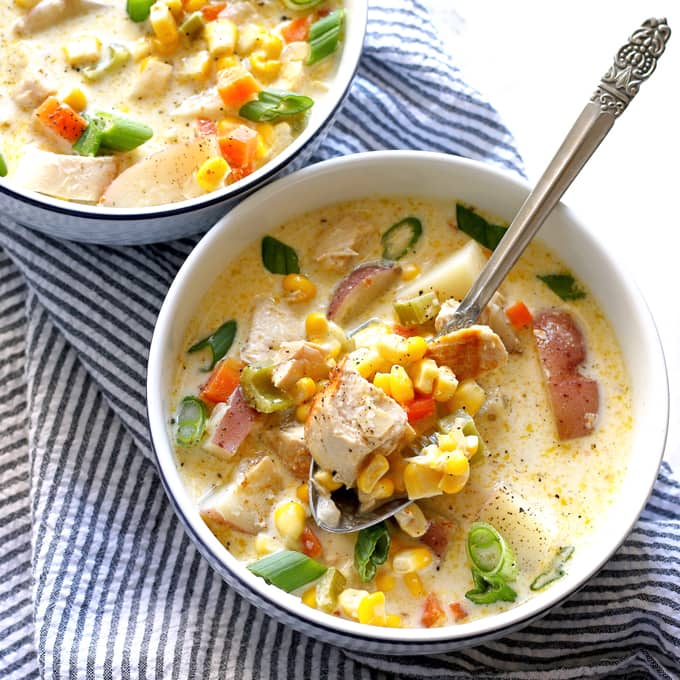 This chicken corn chowder recipe is creamy and hearty comfort food. The recipe is easy to follow and full of veggies! | honeyandbirch.com