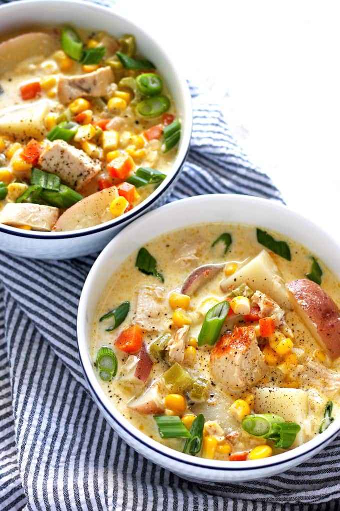 two bowls of chicken corn chowder