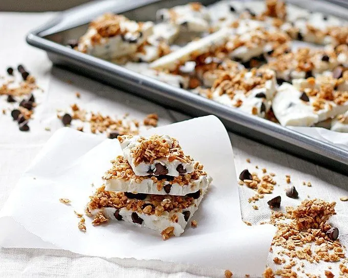 Chocolate chip granola yogurt bark made with non-fat Greek yogurt and honey - the perfect quick snack or breakfast! Whip up a batch and keep it in your freezer. 