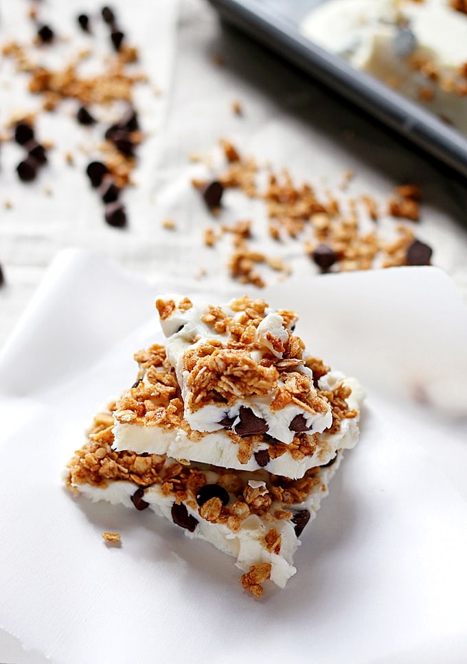 Chocolate chip granola frozen yogurt bark made with non-fat Greek yogurt and honey - the perfect quick snack or breakfast! Whip up a batch and keep it in your freezer. 