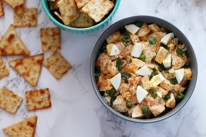 Deviled egg dip is perfect for using up extra hard boiled eggs. It is a chunky dip and is perfect for Easter and holiday parties! | honeyandbirch.com