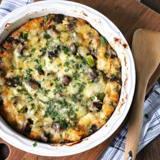 This asparagus mushroom swiss egg bake is perfect for brunch or breakfast! It can be prepared overnight and most of the cooking is done in the oven. Consider making this easy recipe your go to Mother's Day recipe! | honeyandbirch.com