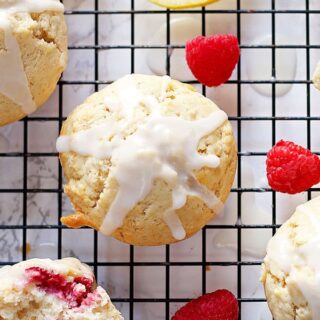 These raspberry lemon muffins with lemon glaze are sweet and tart at the same time! They are perfect for brunches, breakfast or snacks on-the-go! | honeyandbirch.com
