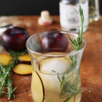 Rosemary's Plum gin cocktail is a blend of fresh ingredients and aromas. Thanks to the addition of fresh plum and St. Germain there is no need to add any additional sugar. Instead, I pair it with gin and rosemary for a fresh and herbaceous drink. | honeyandbirch.com