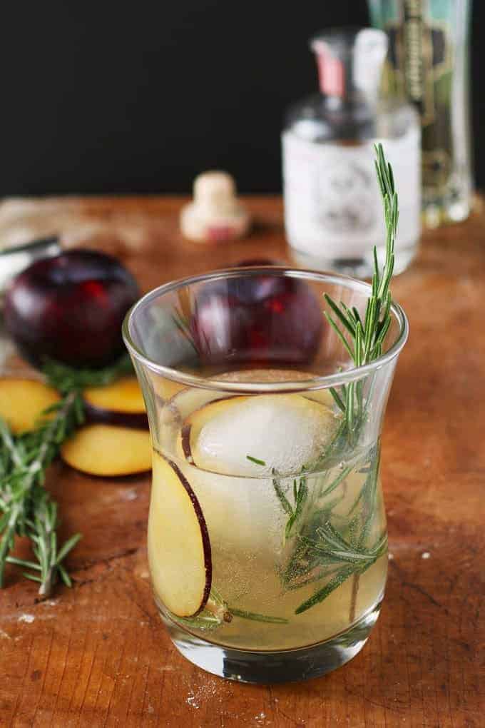 Rosemary's Plum gin cocktail is a blend of fresh ingredients and aromas. Thanks to the addition of fresh plum and St. Germain there is no need to add any additional sugar. Instead, I pair it with gin and rosemary for a fresh and herbaceous drink. | honeyandbirch.com