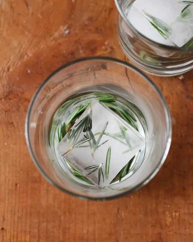 Rosemary's Plum gin cocktail is a blend of fresh ingredients and aromas. Thanks to the addition of fresh plum and St. Germain there is no need to add any additional sugar. Instead, I pair it with gin and rosemary for a fresh and herbaceous drink. | honeyandbirch.com