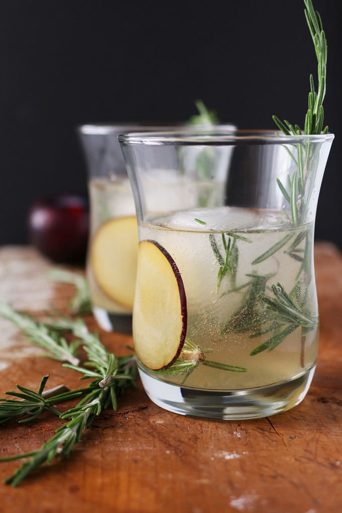 Rosemary's Plum gin cocktail is a blend of fresh ingredients and aromas. Thanks to the addition of fresh plum and St. Germain there is no need to add any additional sugar. Instead, I pair it with gin and rosemary for a fresh and herbaceous drink. | honeyandbirch.com