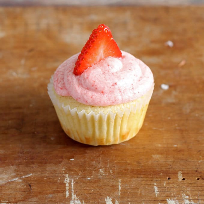 Strawberry lemonade cupcakes are the perfect spring dessert! Sweet and tangy - one of the BEST combinations out there! | honeyandbirch.com