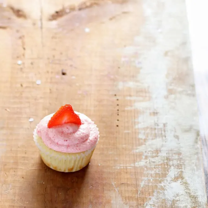 Strawberry lemonade cupcakes are the perfect spring dessert! Sweet and tangy - one of the BEST combinations out there! | honeyandbirch.com