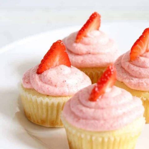 Strawberry lemonade cupcakes are the perfect spring dessert! Sweet and tangy - one of the BEST combinations out there! | honeyandbirch.com