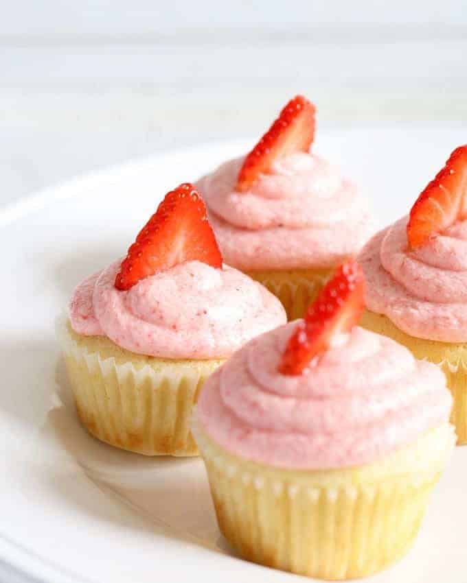 Strawberry lemonade cupcakes are the perfect spring dessert! Sweet and tangy - one of the BEST combinations out there! | honeyandbirch.com