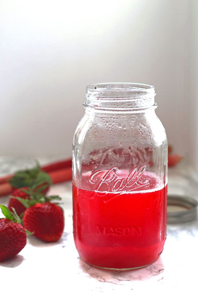 This strawberry rhubarb daiquiri recipe is the perfect spring cocktail! Plus, a recipe for homemade strawberry rhubarb simple syrup. | honeyandbirch.com