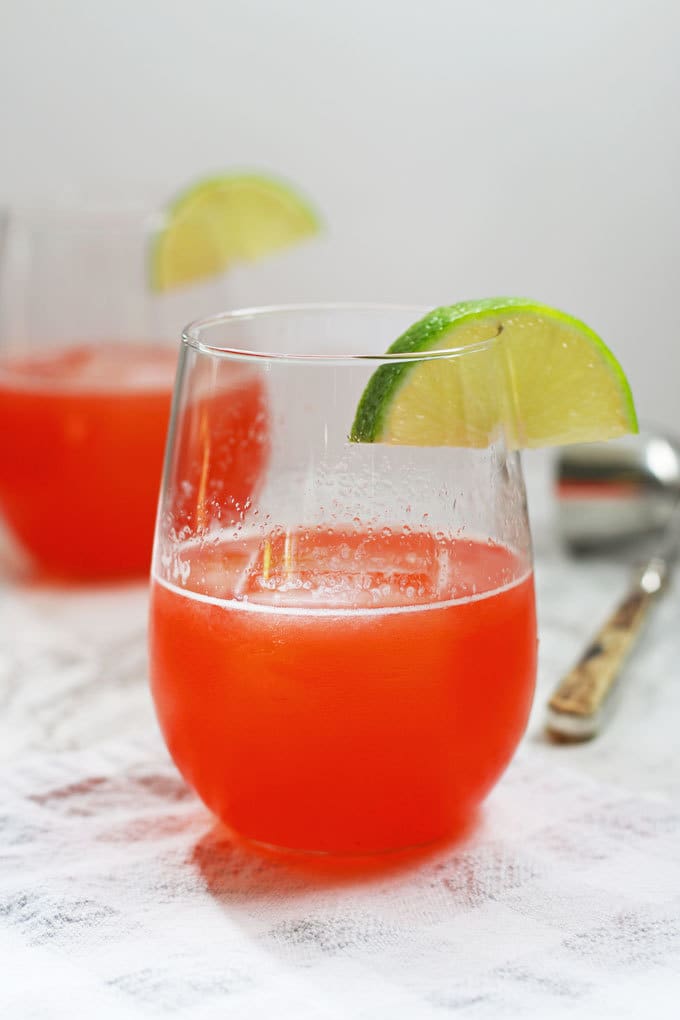 This strawberry rhubarb daiquiri recipe is the perfect spring cocktail! Plus, a recipe for homemade strawberry rhubarb simple syrup. | honeyandbirch.com