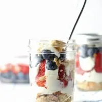 This red white and blue cheesecake parfait recipe is the perfect dessert for Memorial Day, Labor Day and Fourth of July parties! They are easy to make, full of fresh fruit and delicious!