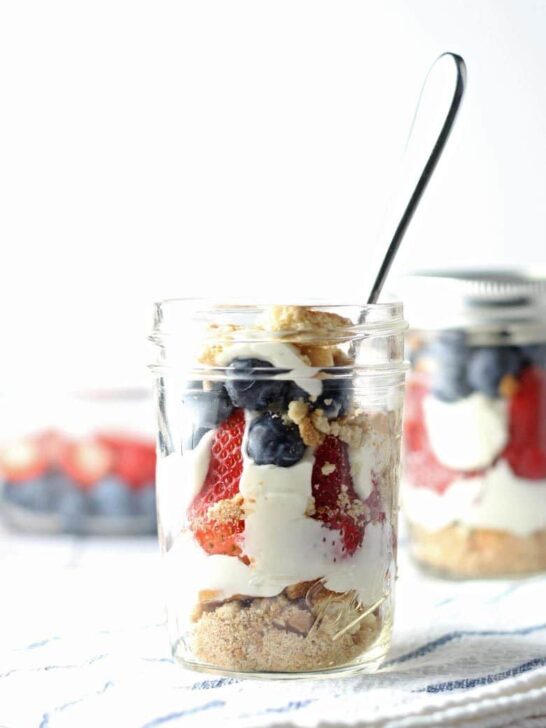 This red white and blue cheesecake parfait recipe is the perfect dessert for Memorial Day, Labor Day and Fourth of July parties! They are easy to make, full of fresh fruit and delicious!