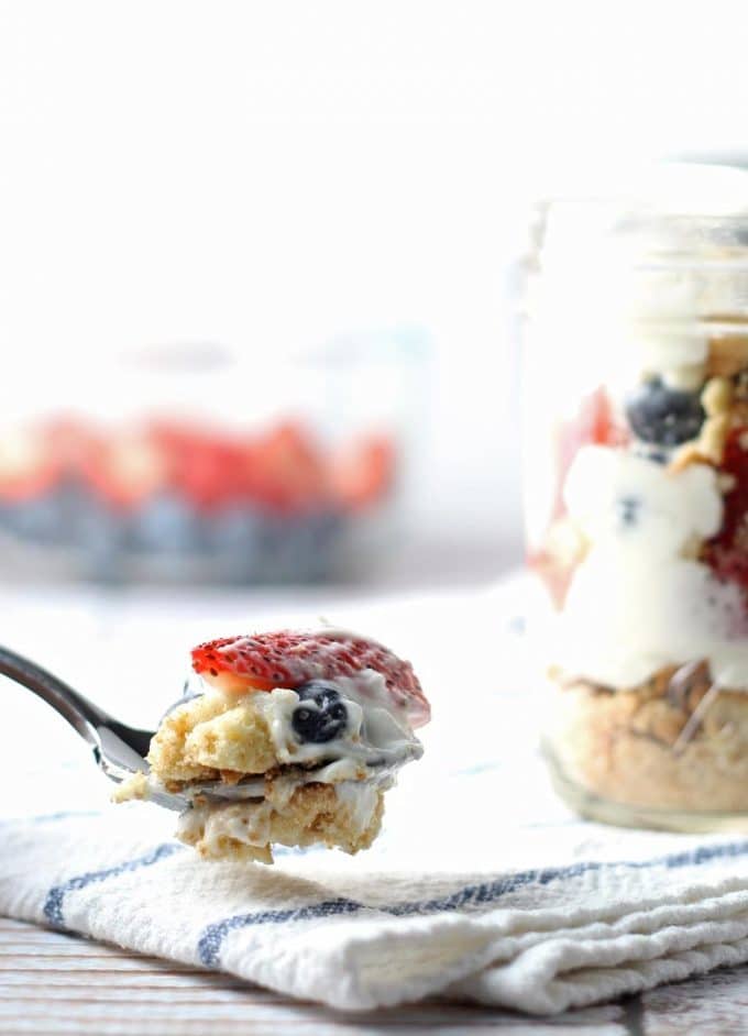 This red white and blue cheesecake parfait recipe is the perfect dessert for Memorial Day, Labor Day and Fourth of July parties! They are easy to make, full of fresh fruit and delicious!