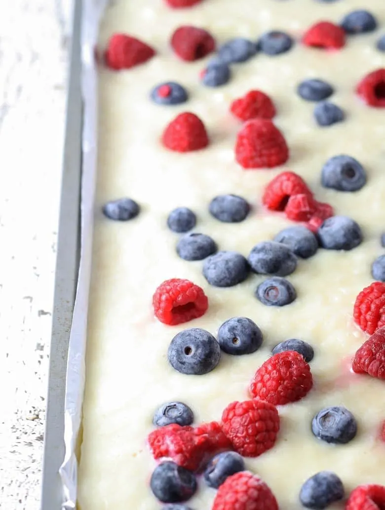red white and blue frozen yogurt bark in a sheet pan