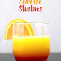 These tequila sunrise slushies are going to be your go-to summer party drink! You can easily multiply the recipe for a pitcher. Only 3 ingredients! | honeyandbirch.com