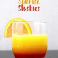 These tequila sunrise slushies are going to be your go-to summer party drink! You can easily multiply the recipe for a pitcher. Only 3 ingredients! | honeyandbirch.com