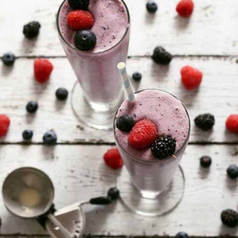 This mixed berry milkshake is easy to make and a great way to use up summer's bounty of berries. You can use any berries you want - raspberries, blackberries, blueberries or strawberries. It will taste delicious each time! | honeyandbirch.com