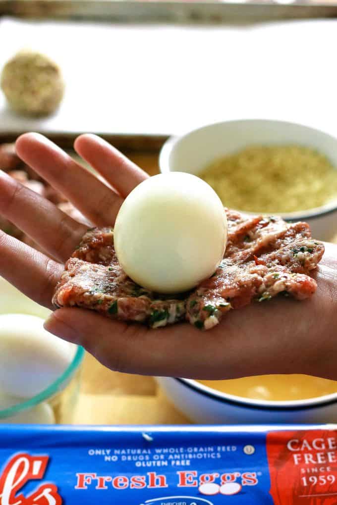hard boiled egg on top of ground meat