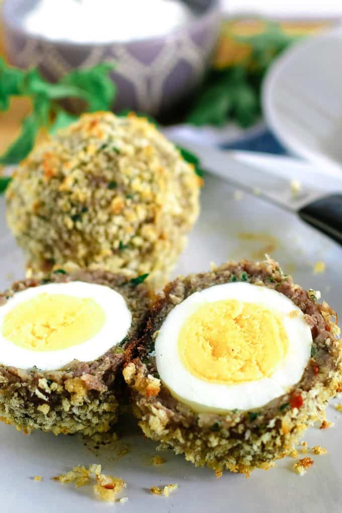 one baked scotch egg cut open