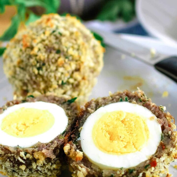 one baked scotch egg cut open