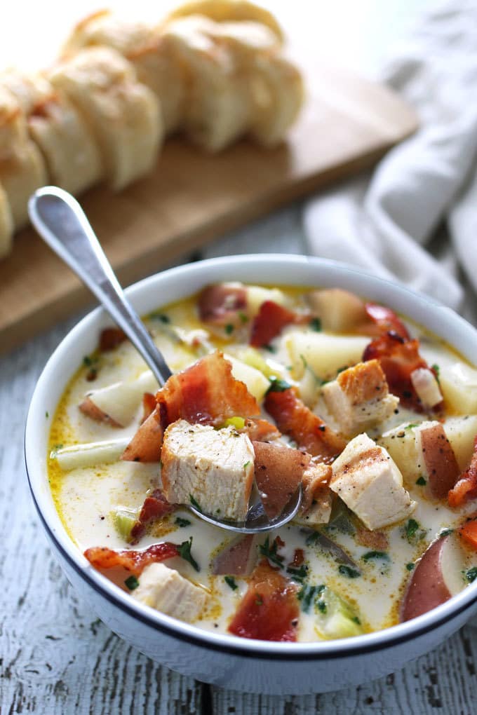 This chicken potato chowder is great for using up leftover grilled chicken breasts. It is easy to make and super tasty thanks to added bacon. | honeyandbirch.com