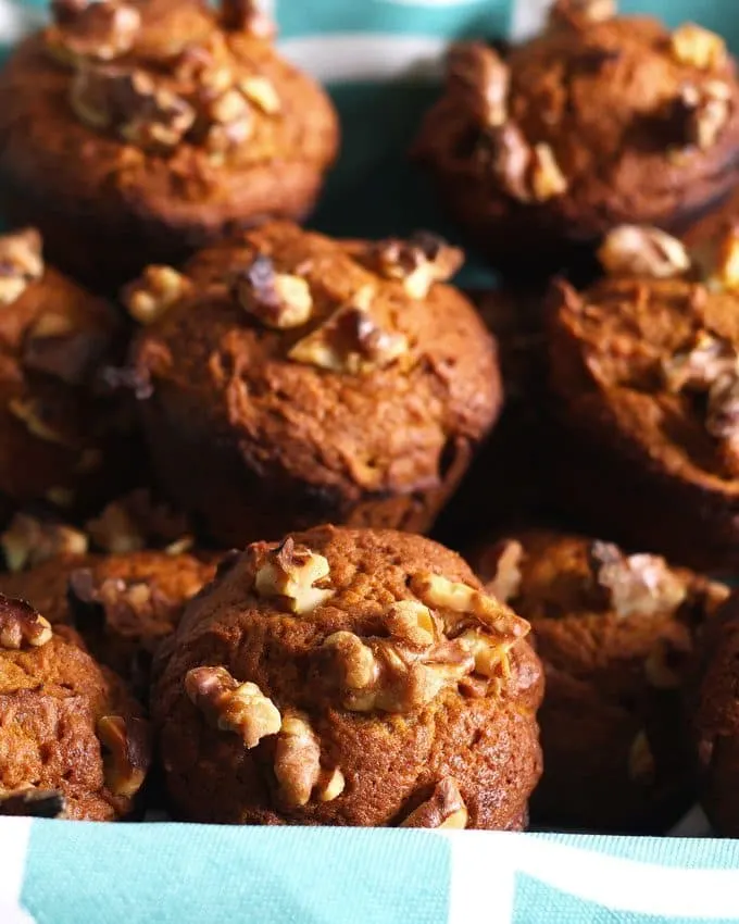These pumpkin nut muffins are perfect when you are looking for a tasty fall breakfast! They are a great alternative to traditional banana nut muffins and are easy to make. | honeyandbirch.com