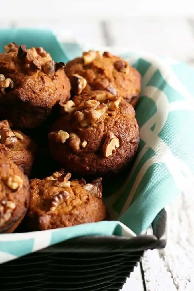 These pumpkin nut muffins are perfect when you are looking for a tasty fall breakfast! They are a great alternative to traditional banana nut muffins and are easy to make. | honeyandbirch.com